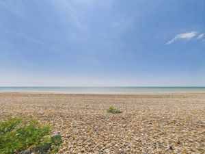 Beach at the bottom of garden - click for photo gallery